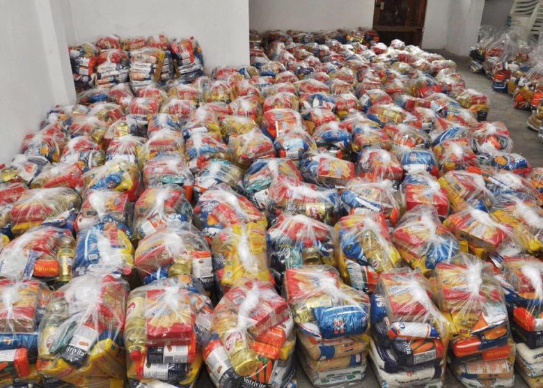 Cestas com alimentos embaladas para entrega à população (Foto: Mário Andrade/Divulgação) 