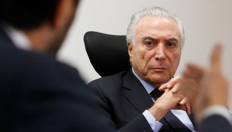 Temer em reunião com deputados na sexta-feira 28. A barganha começou.